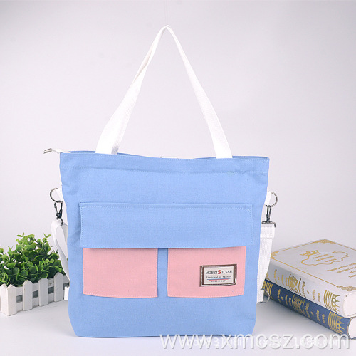 Blue letters crossover tote bag with pocket
